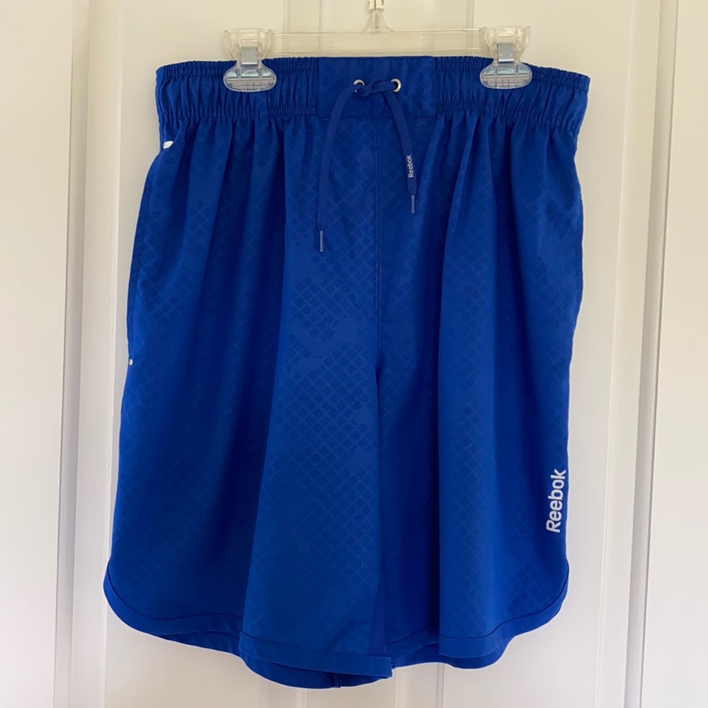 Reebok blue athletic shorts 3 pockets 1 zippered NWOT